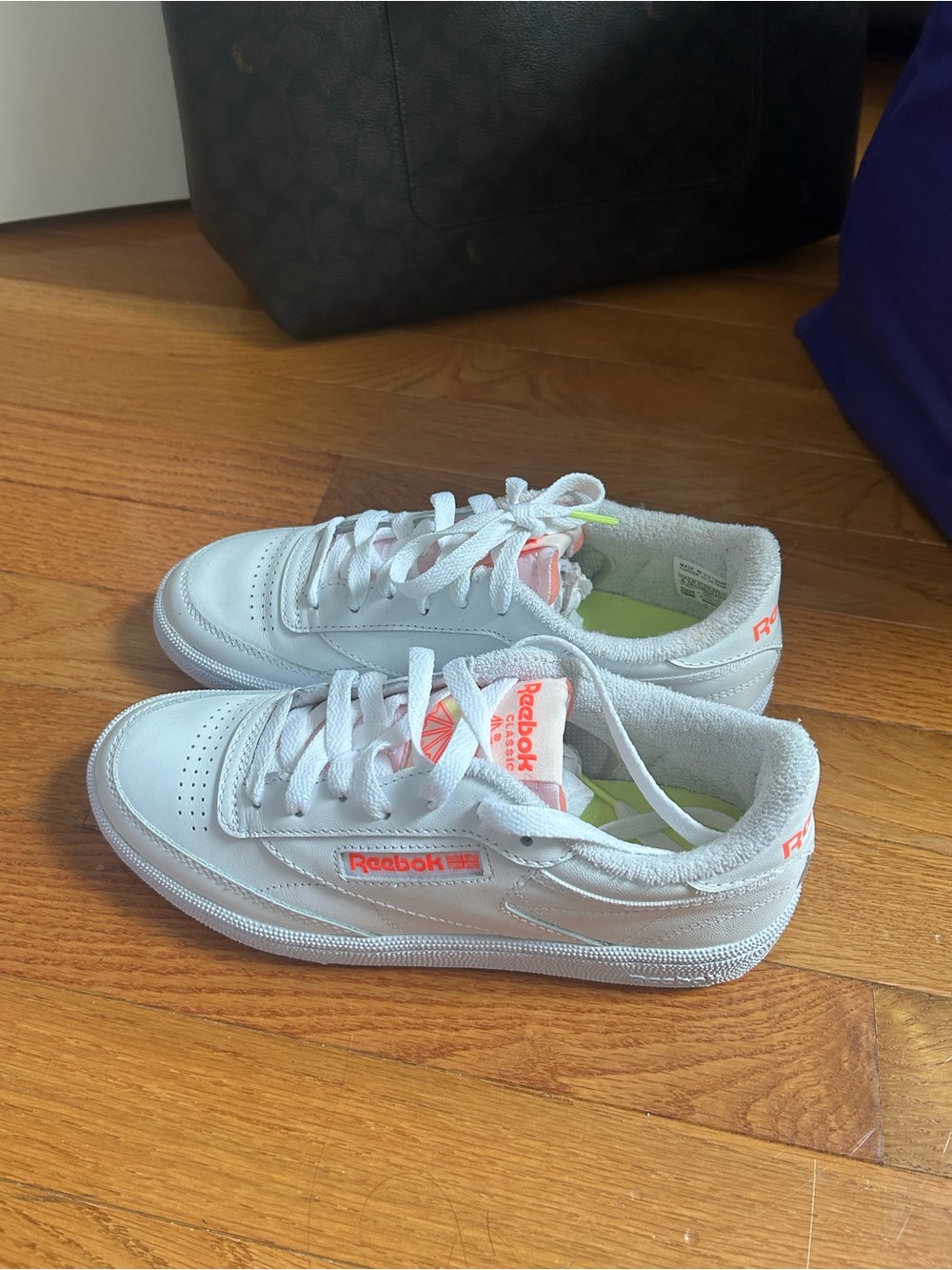Reebok Kids White Sneakers with Coral Accents